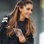 EXCLUSIVE: Ariana Grande leaves a recording studio holding a CD